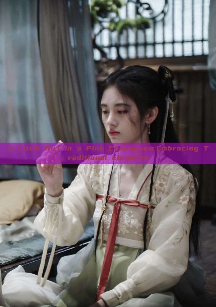 A Little Girl in a Pink Cheongsam:Embracing Traditional Elegance A Little Girl in a Pink Cheongsam:Embracing Traditional Elegance