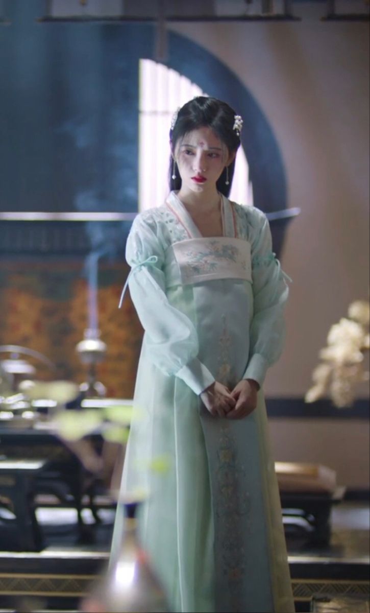 Traditional Elegance in a Girls Tang Suit and Cheongsam Dress Traditional Elegance in a Girls Tang Suit and Cheongsam Dress