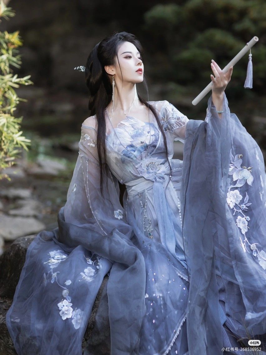 The Enchantment of Blue Flash Butterflies in Cheongsams Embrace The Enchantment of Blue Flash Butterflies in Cheongsams Embrace