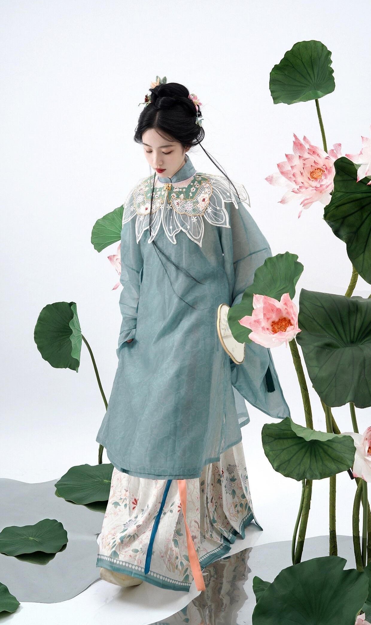 Redesigning the Cheongsam for Petite Winter Fashionistas:A Guide for Short-Statured Women Redesigning the Cheongsam for Petite Winter Fashionistas:A Guide for Short-Statured Women