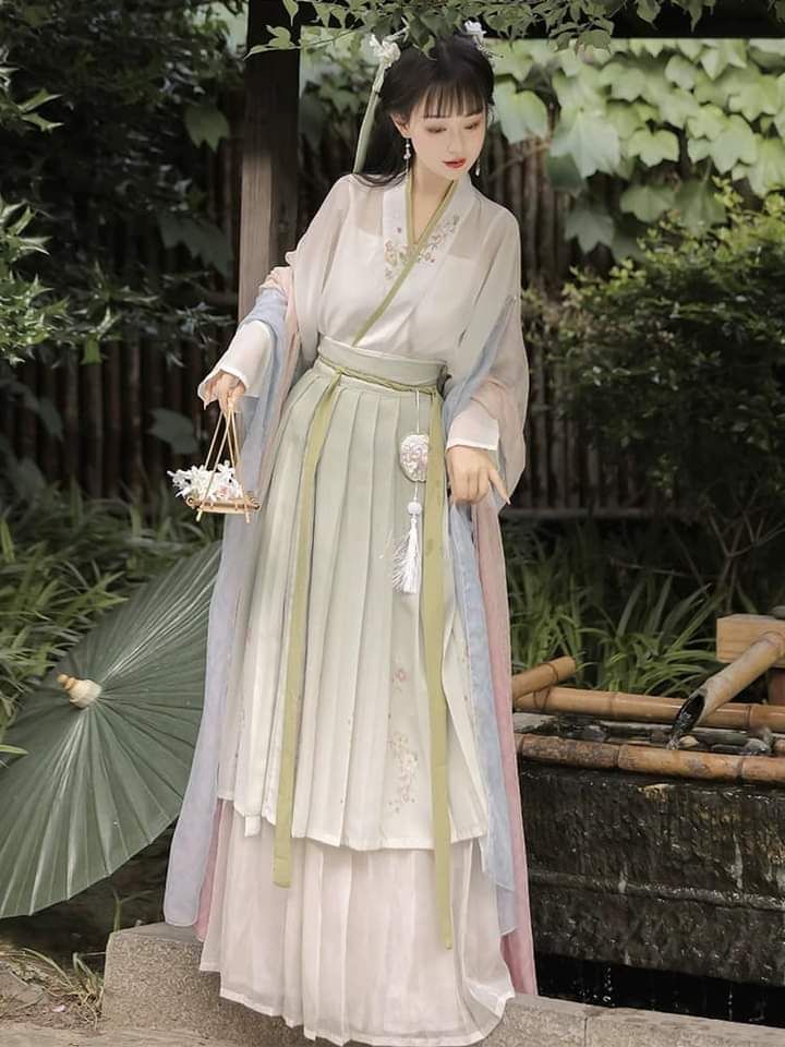 The Enchanting Chinese Cheer of the Traditional Qipao-Clad Kitchen Maiden The Enchanting Chinese Cheer of the Traditional Qipao-Clad Kitchen Maiden